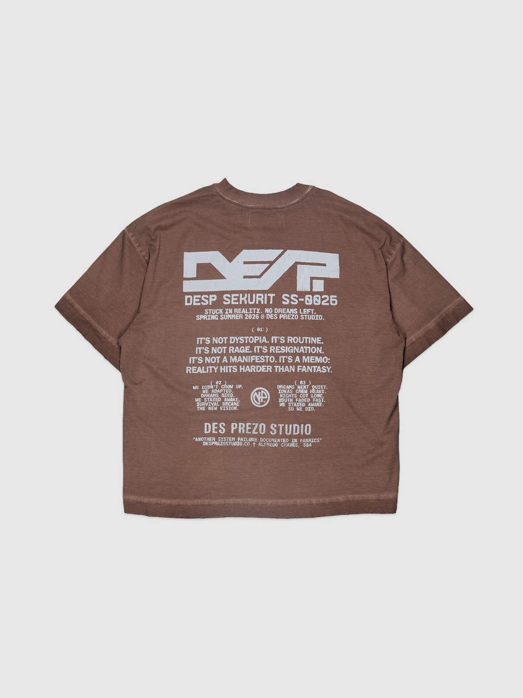 DES.P SEKURIT Tee — Brown stone-washed oversized boxy graphic t-shirt with skull print | Camiseta marrom estonada com estampa de caveira — Des Prezo Studio