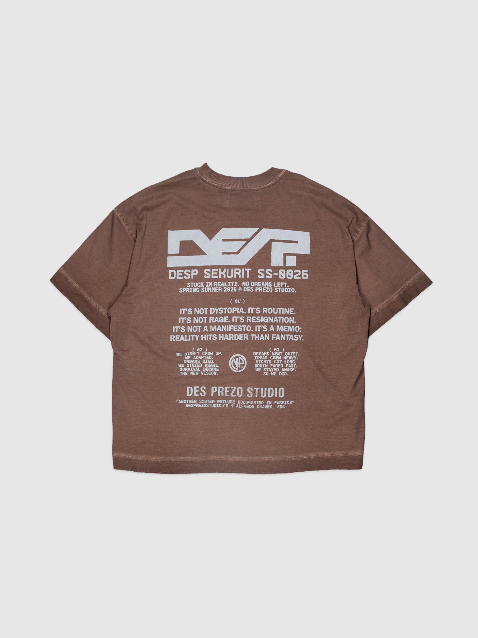 DES.P SEKURIT Tee — Brown stone-washed oversized boxy graphic t-shirt with skull print | Camiseta marrom estonada com estampa de caveira — Des Prezo Studio
