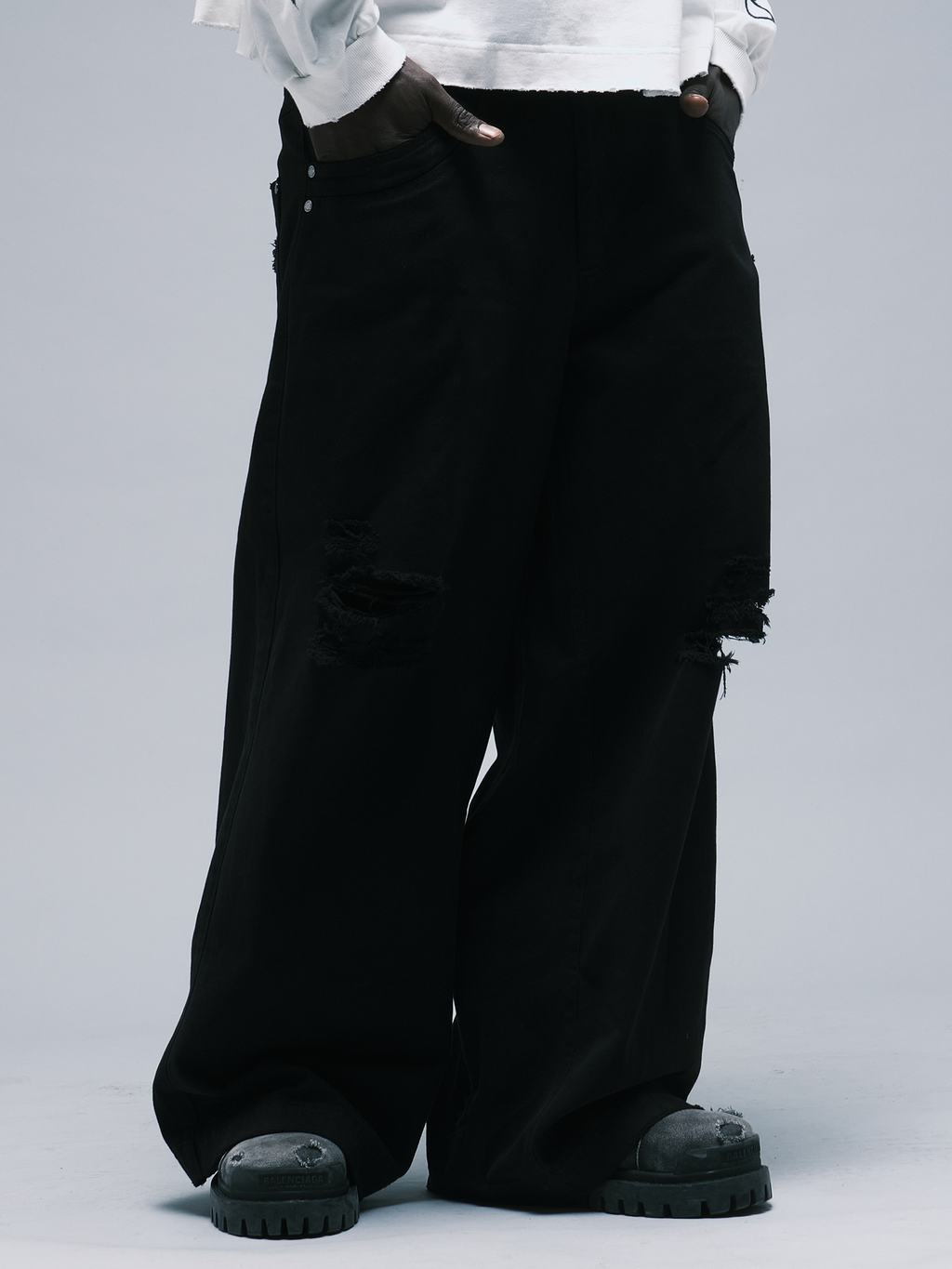 WORN OUT BLACK PANTS