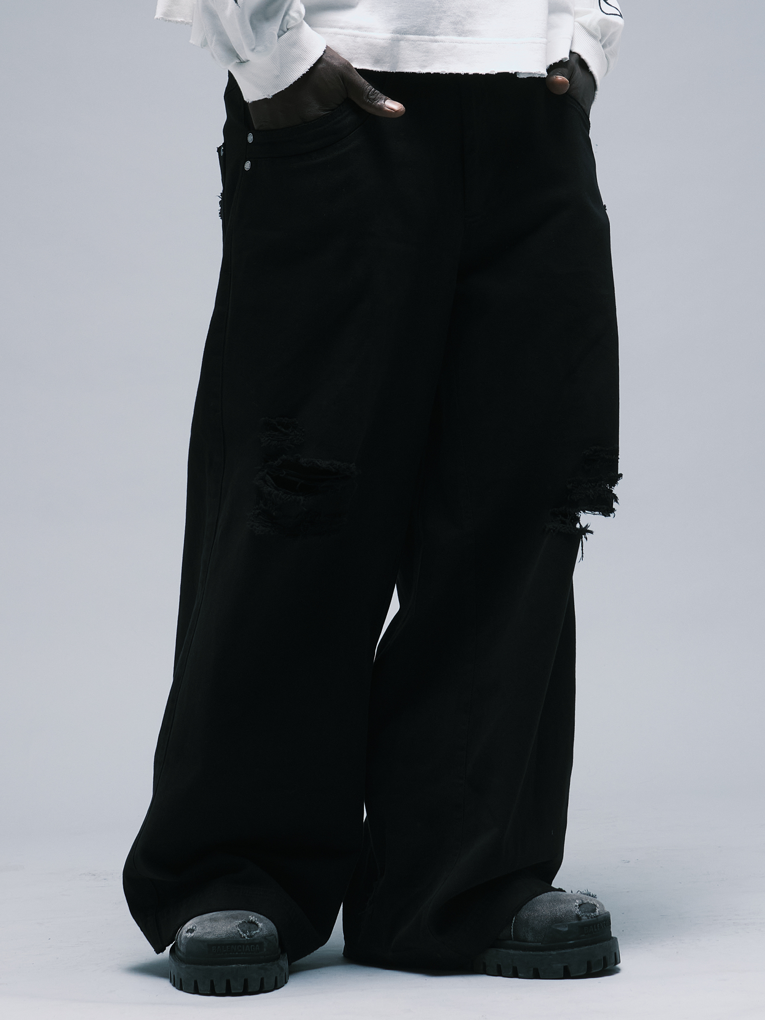 WORN OUT BLACK PANTS