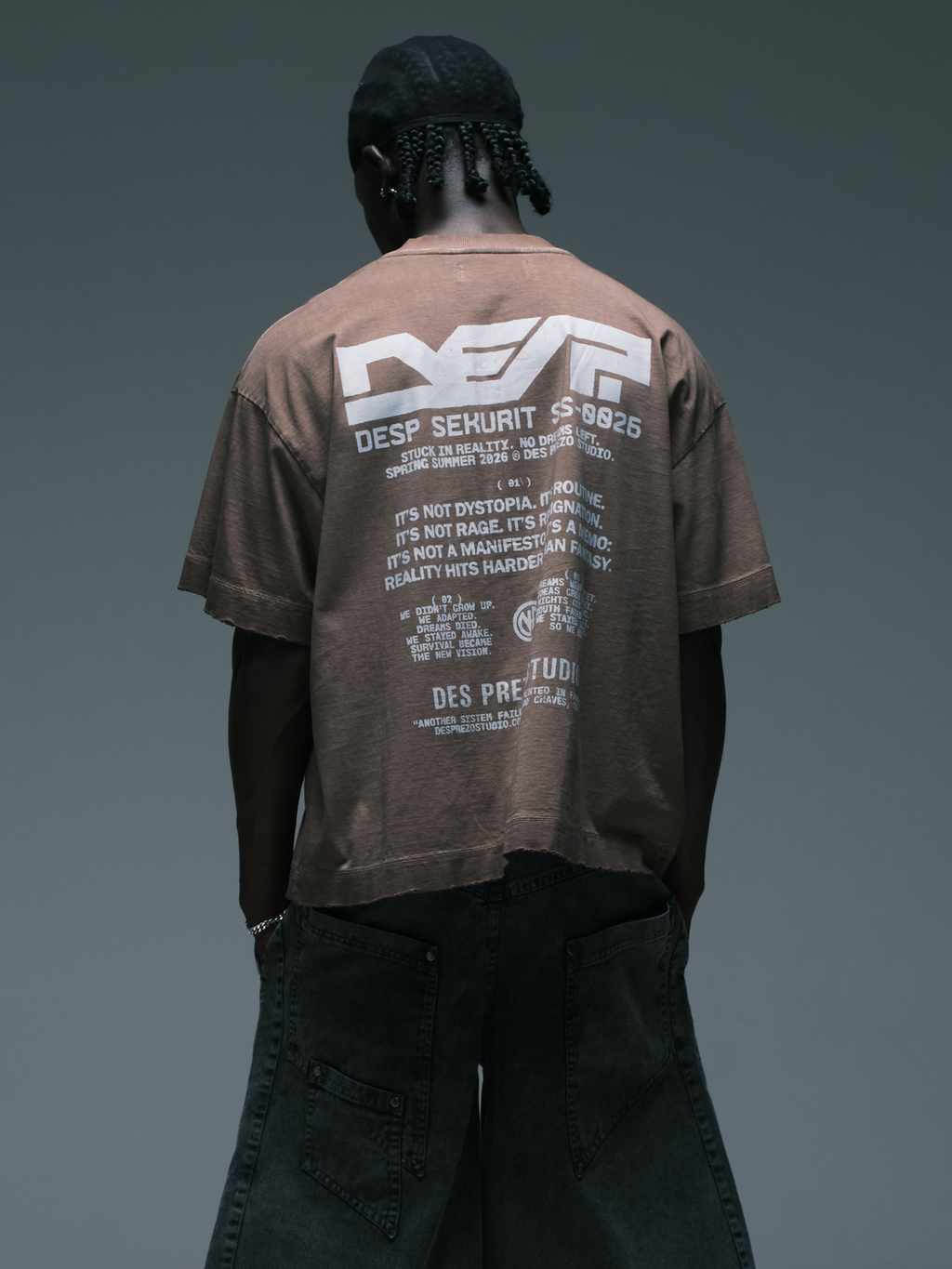 DES.P SEKURIT Tee — Brown stone-washed oversized boxy graphic t-shirt with skull print | Camiseta marrom estonada com estampa de caveira — Des Prezo Studio