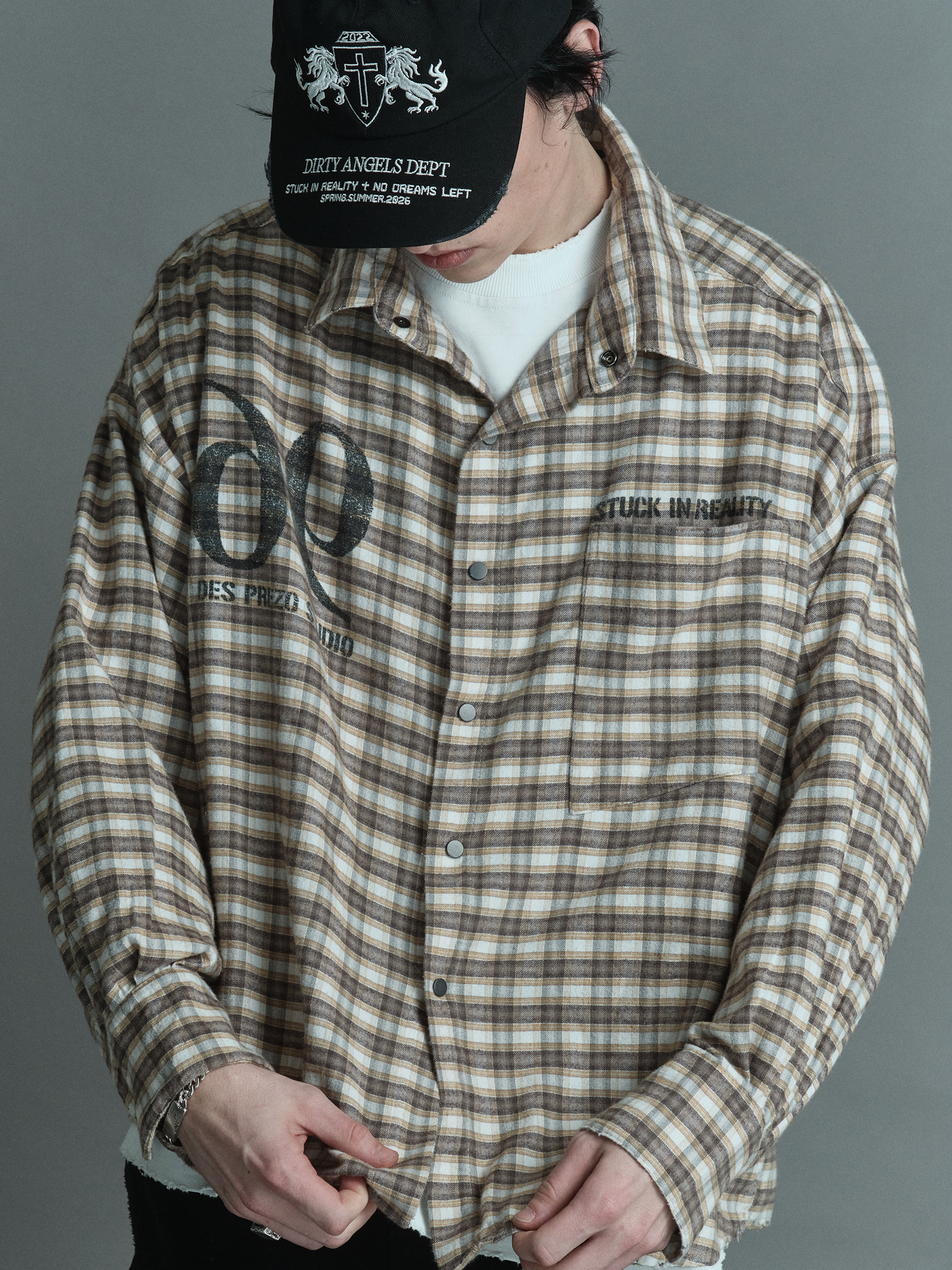 Stuck In Reality Flannel — Beige plaid flannel shirt with printed graphics | Camisa flanela xadrez bege com gráficos estampados — Des Prezo Studio