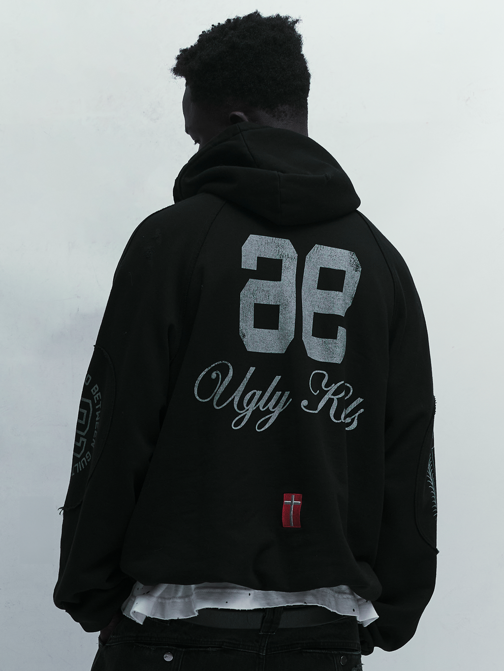 Ugly Academy Hoodie — Black hoodie with front graphic and sleeve prints | Moletom preto com gráfico frontal e estampas nas mangas — Des Prezo Studio