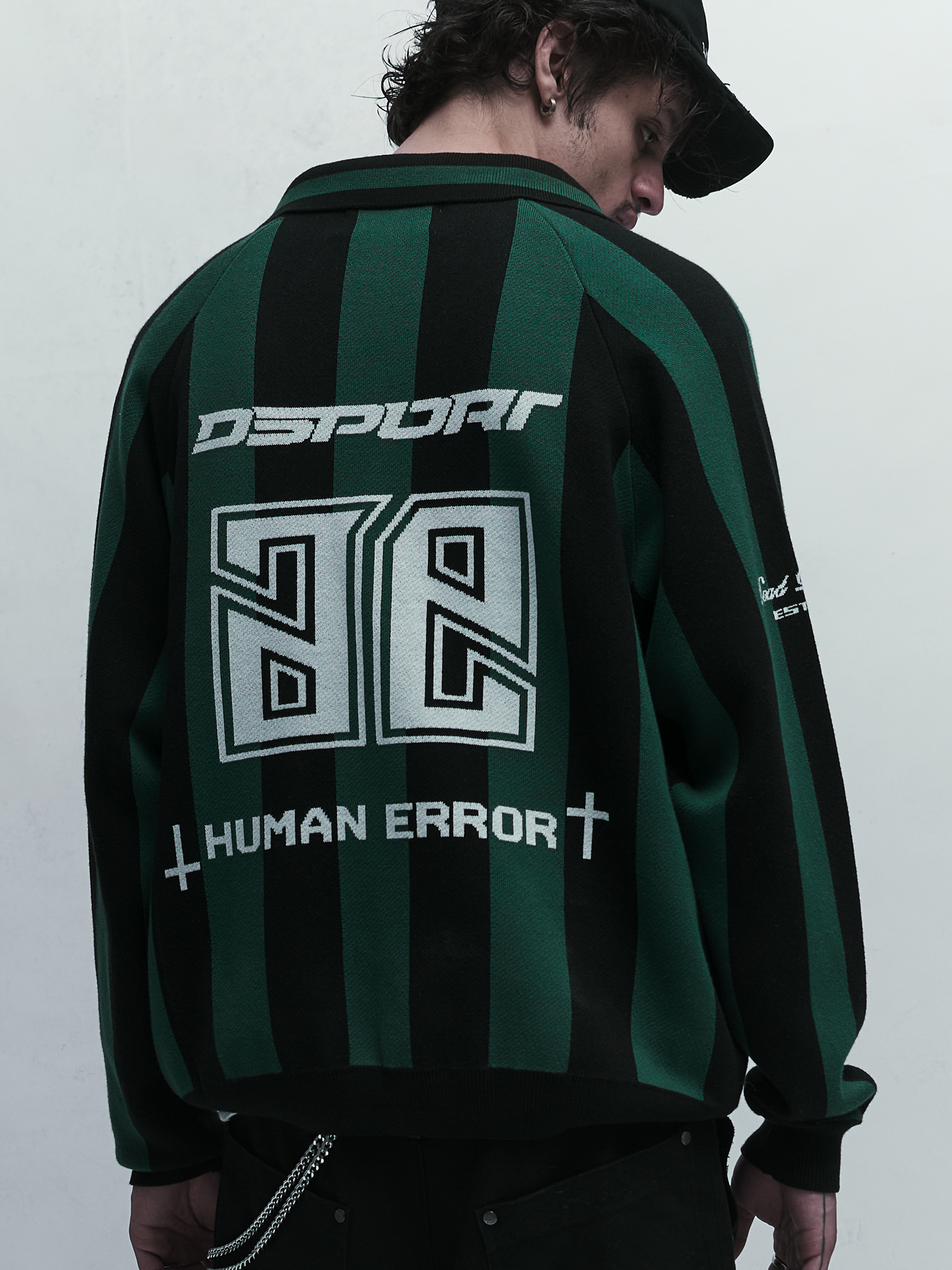 Undrgrnd Addcts Knit — Green and black striped jacquard jersey with front graphics | Suéter jacquard de malha listrado verde e preto com gráficos frontais — Des Prezo Studio